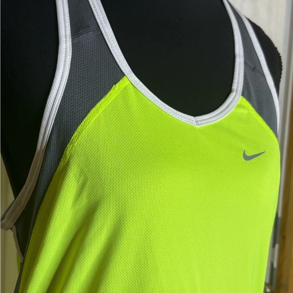 Nike Women's One Dri-FIT tank top in a neon yellow color size M